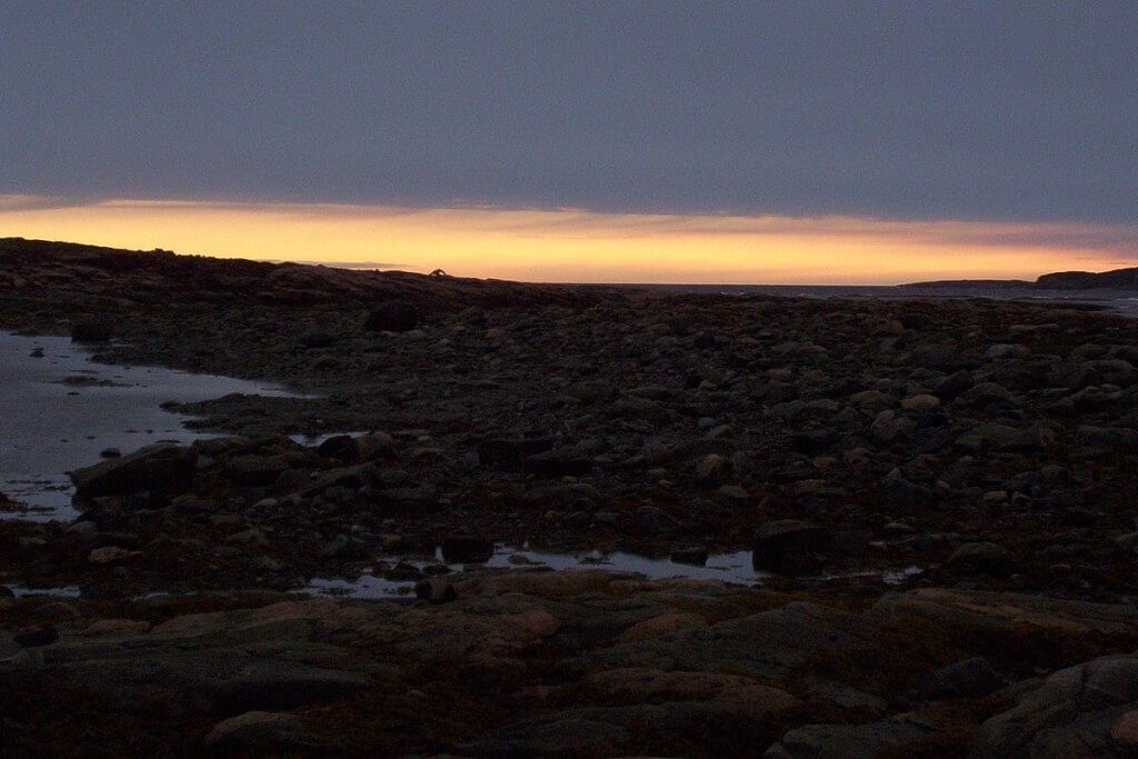 photograph of midnight in Nunavut, the land of the midnight sun, Canada.
