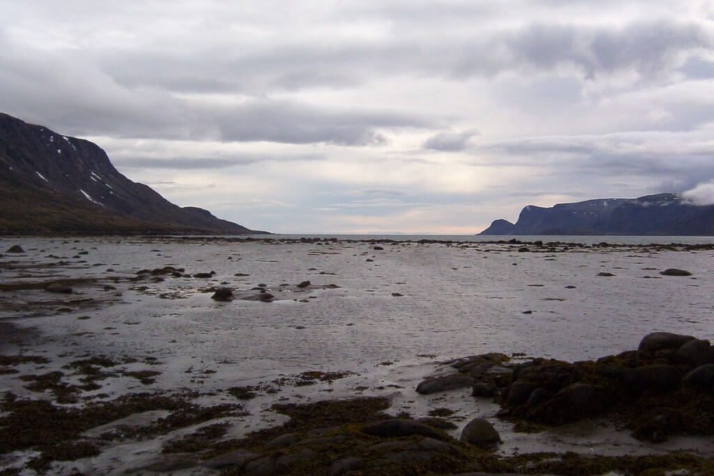 photograph of rain clouds above pangnirtung fjord on Baffin Island, Nunavut, Canada.