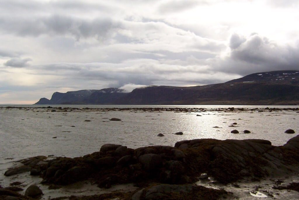 photograph of rain clouds above pangnirtung fjord on Baffin Island, Nunavut, Canada.