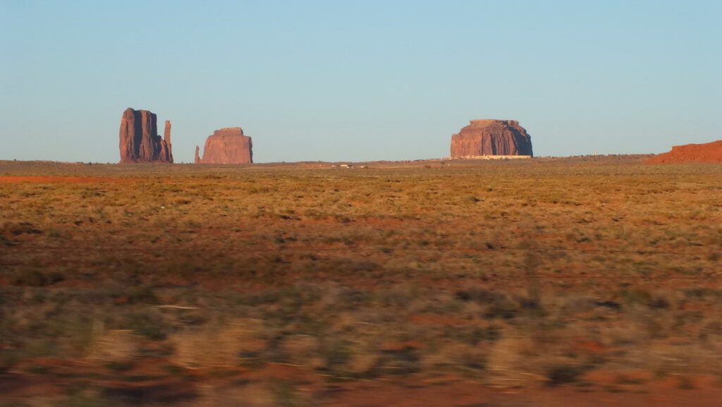 view of Monument Valley from highway in Arizona, USA