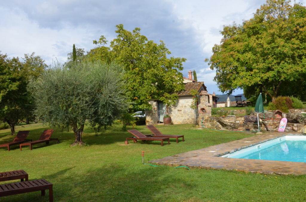 courtyard at the stone farmhouse at Il Colombaio di Cencio, Gaiole, Chianti, Tuscany, Italy