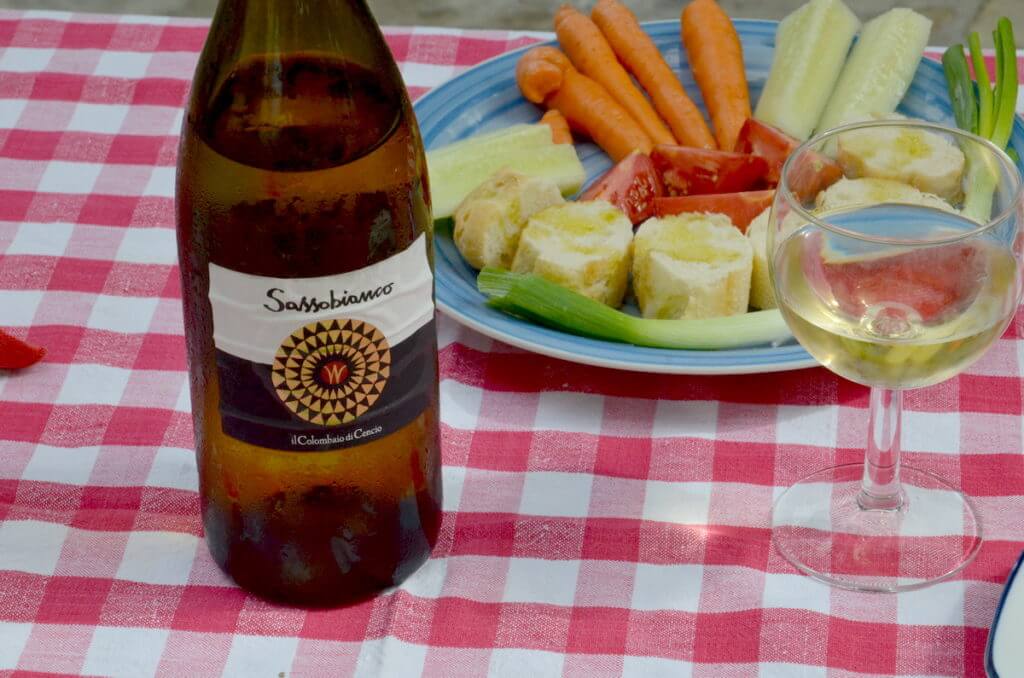 bottle of wine at lunch at il colombaio di cencio vineyard, gaiole in chianti, itay
