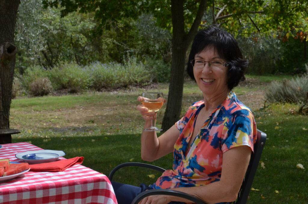 jean with wine at lunch at il colombaio di cencio vineyard, gaiole in chianti, itay