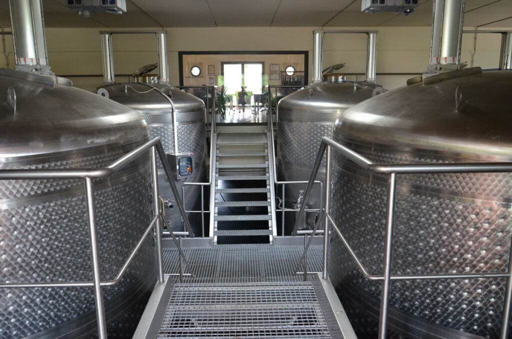wine tanks in tank room at il colombaio di cencio vineyard, gaiole in chianti, itay