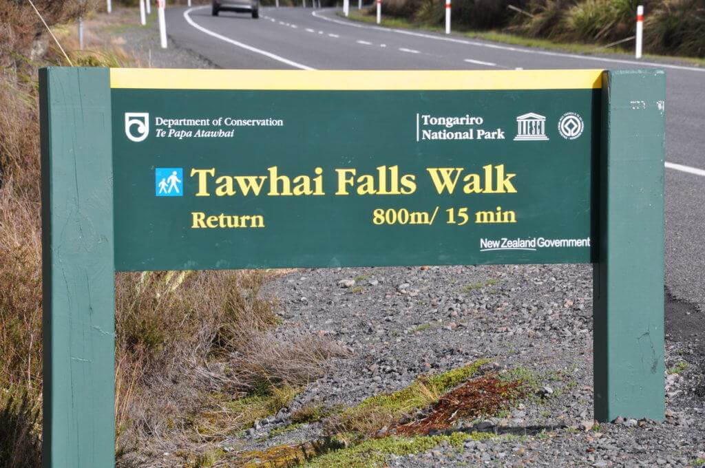 An image of the Tawhai Falls Walk sign in Tongariro National Park in New Zealand. Photography by Frame To Frame - Bob and Jean.