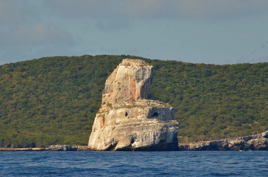 An image of Islotes Las Monas, the eroded remnants of an offshore tuff beside Isla Isabel off San Blas, Mexico. Photography by Frame To Frame - Bob and Jean.