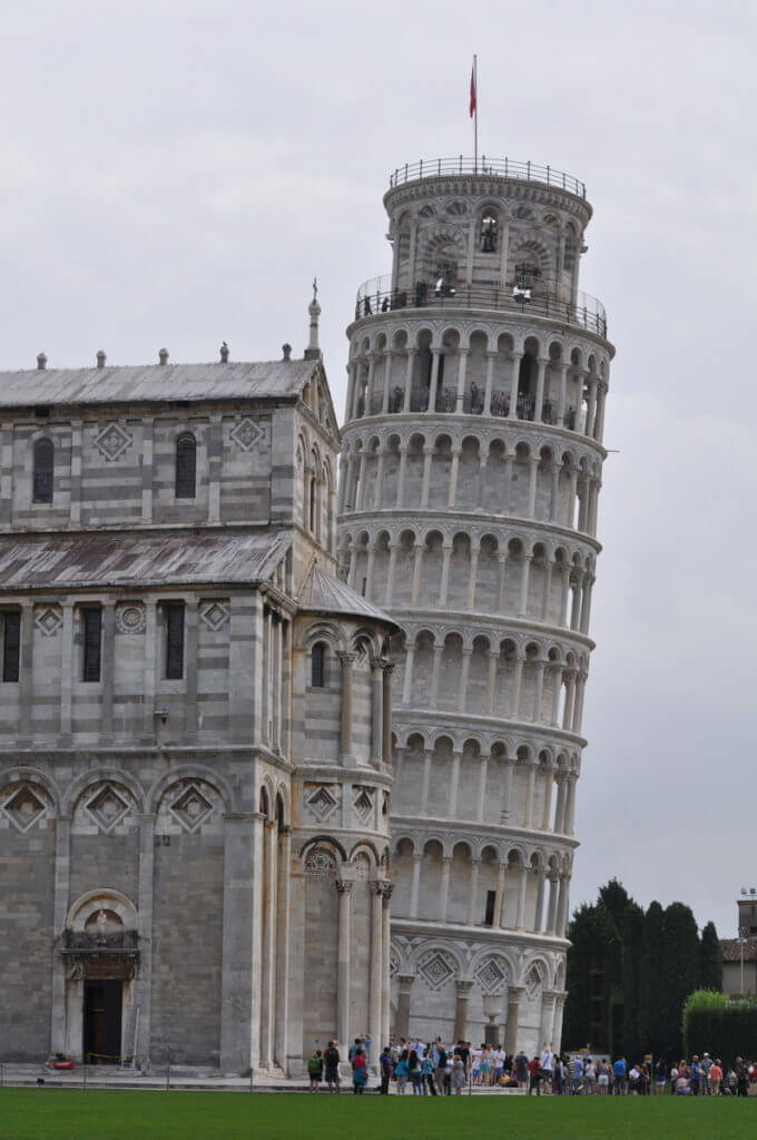 An image of the leaning tower of pisa standing beside the Pisa Cathedral in Tuscany, Italy. Photography by Frame To Frame - Bob and Jean.