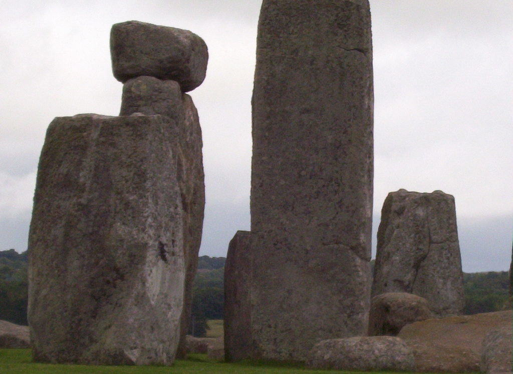 An image of a lintel stone sitting on the top of a stone pillar at Stonehenge in Wiltshire, England. Photography by Frame To Frame - Bob and Jean