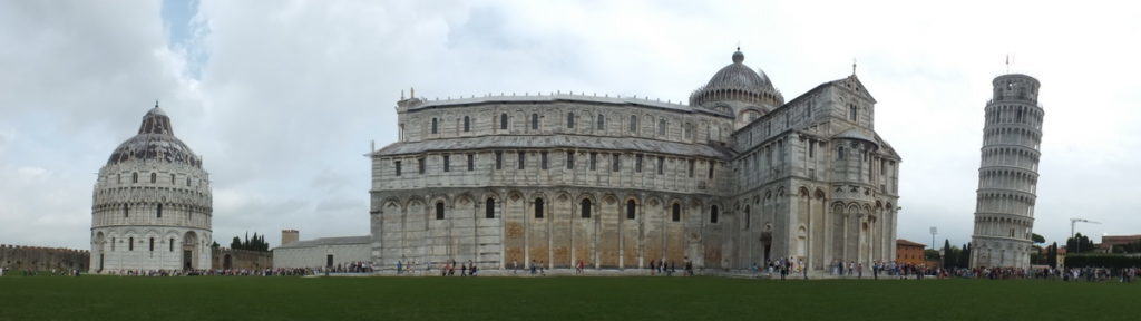 A wide angle image of the buildings around the Leaning Tower of Pisa in Tuscany, Italy. Photography by frame To Frame - Bob and Jean.