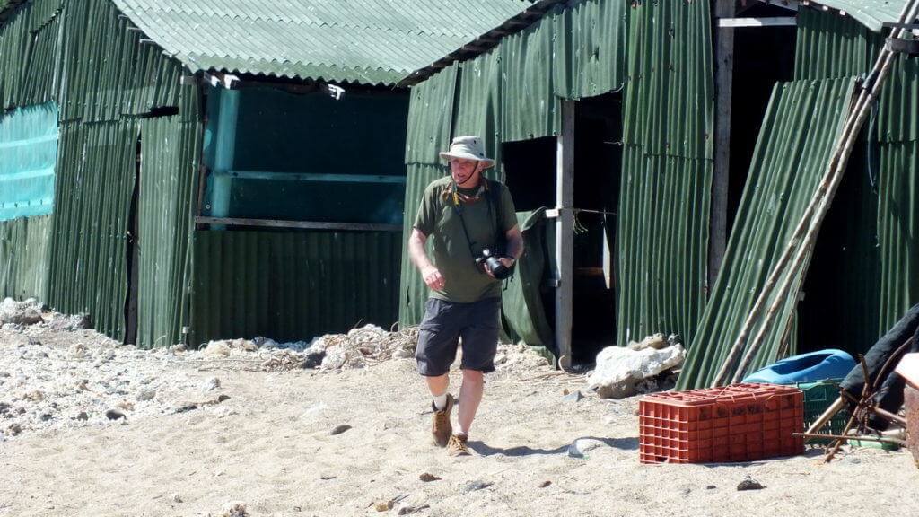 An image of Bob walking along the beach on Isla Isabel off San Blas, Mexico. Photography by Frame To Frame - Bob and Jean.