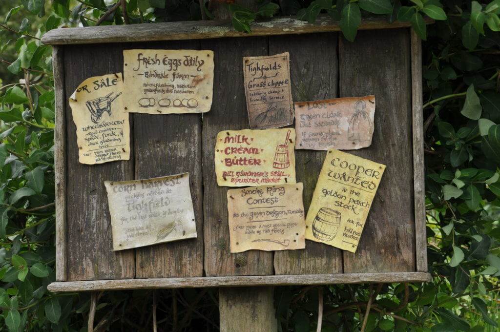 An image of the community billboard in Hobbiton in New Zealand. Photography by Frame To Frame - Bob and Jean.
