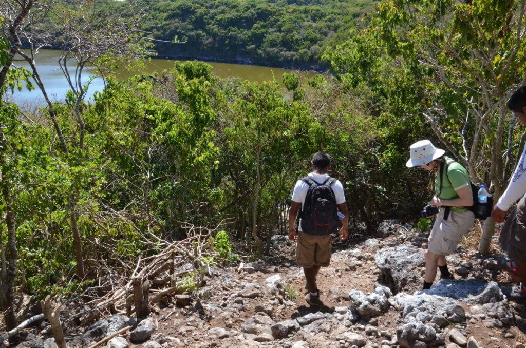 An image of Jean and the birding guides hiking down to a lake on Isla Isabel in Mexico. Photography by Frame To Frame - Bob and Jean.