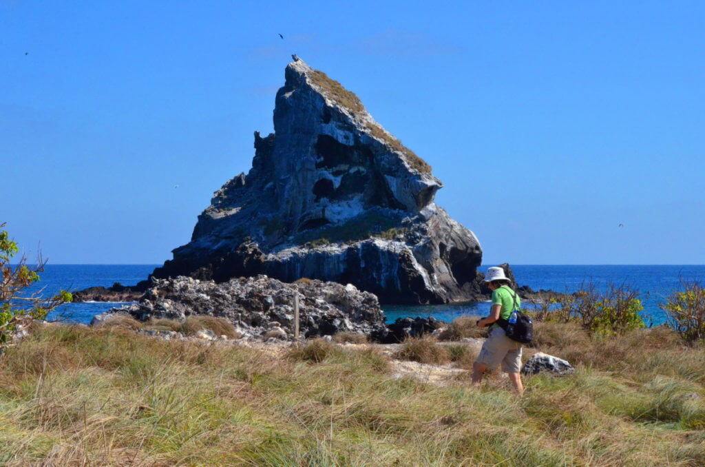 An image of Jean hiking along the coast of Isla Isabel off San Blas, Mexico. Photography by Frame To Frame - Bob and Jean.