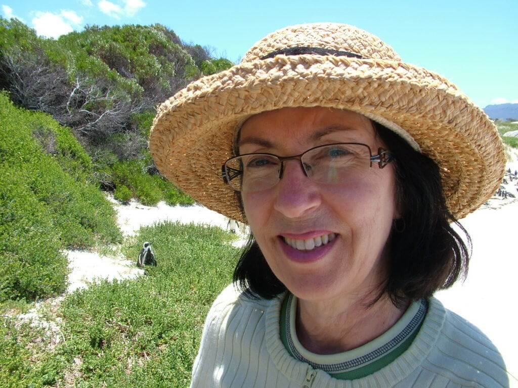 jean on the beach at the african penguin colony at boulders beach, table mountain national park, south africa