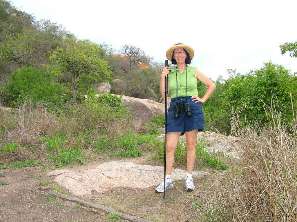 An image of Jean hiking at Kruger National Park, South Africa. Photography by Frame To Frame - Bob and Jean.