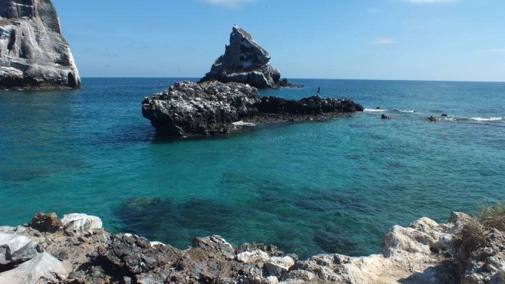 An image of the rocky shoreline along Isla Isabel off San Blas, Mexico. Photography by Frame To Frame - Bob and Jean.