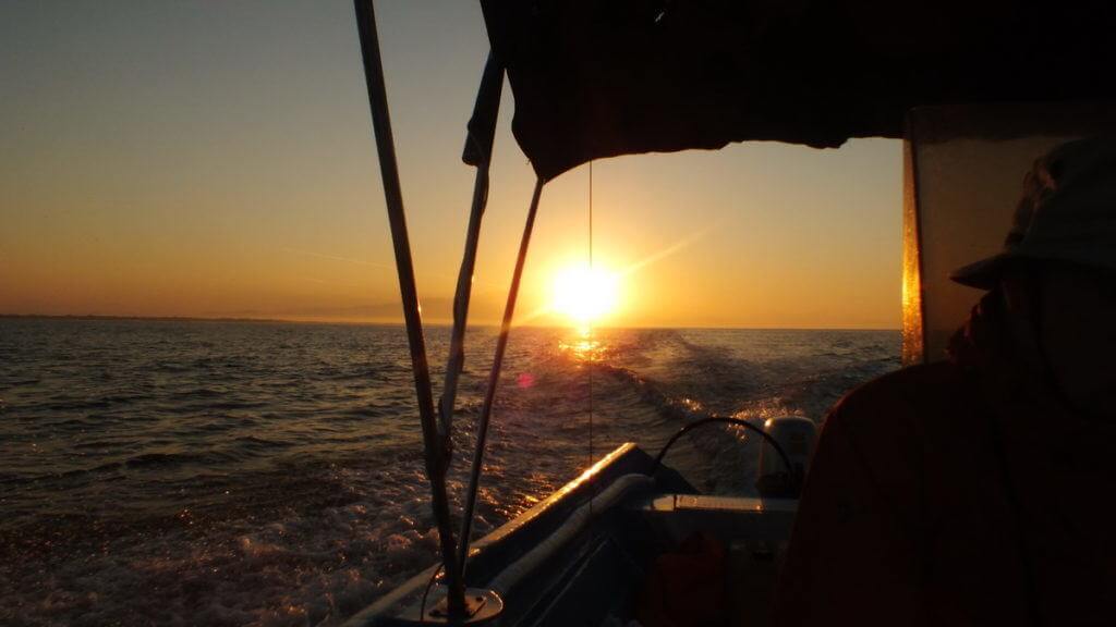 the Sun rising above the horizon on the Pacific Ocean off San Blas, Mexico
