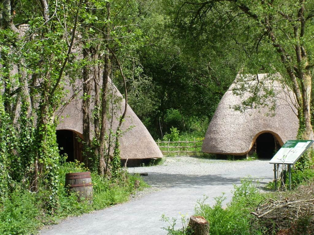 recreated thatched huts at Irish National Heritage Park in Ireland