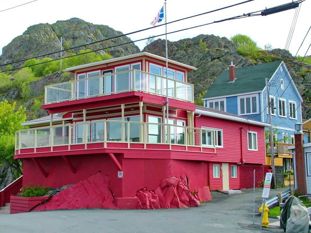 an image of pink and blue houses in St. John's, Newfoundland, Canada