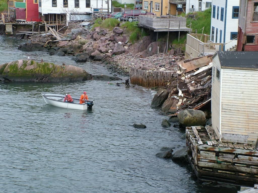 an image of workmen clearing debris from the storm surge of 2010 in St. John's, Newfoundland, Canada