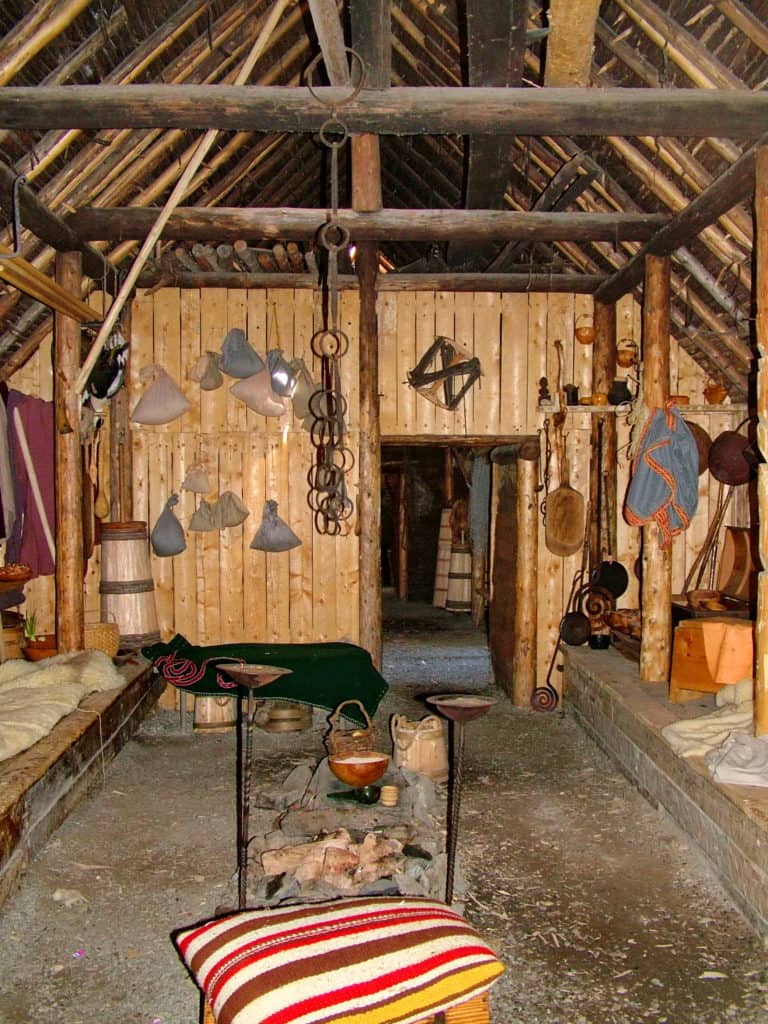 interior of a re-created longhouse at l'anse aux meadows, newfoundland, canada