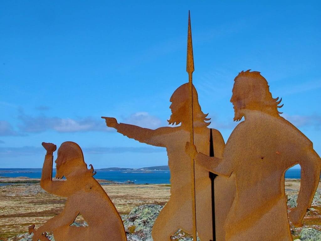 An image of the metal silhouette statue of period Norsemen with weapons at l'anse aux meadows, newfoundland, canada. Photography by Frame To Frame - Bob and Jean.