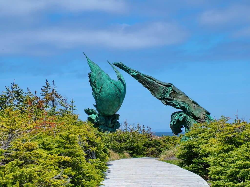 the meeting of two worlds sculpture at l'anse aux meadows, newfoundland, canada