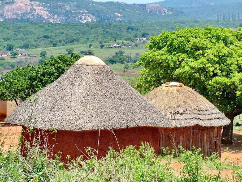 dwellings with a cone-shaped grass roof in swaziland, africa