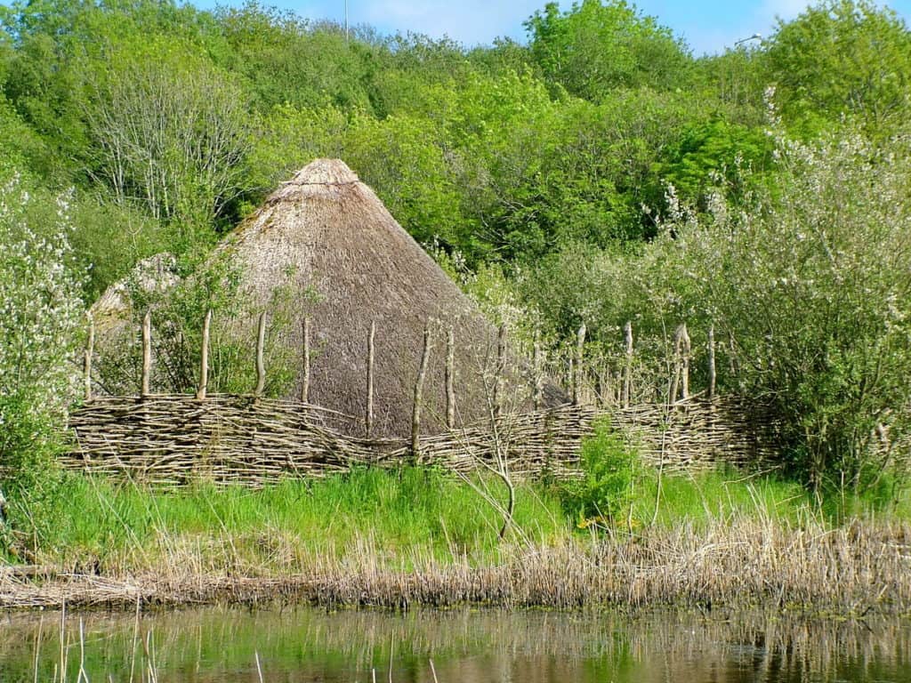 a Crannog on a man-made island at Irish National Heritage Park, Ireland