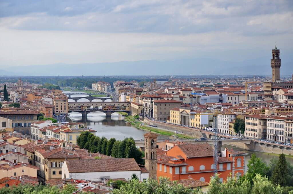 ponte vecchio and river arno in florence, italy