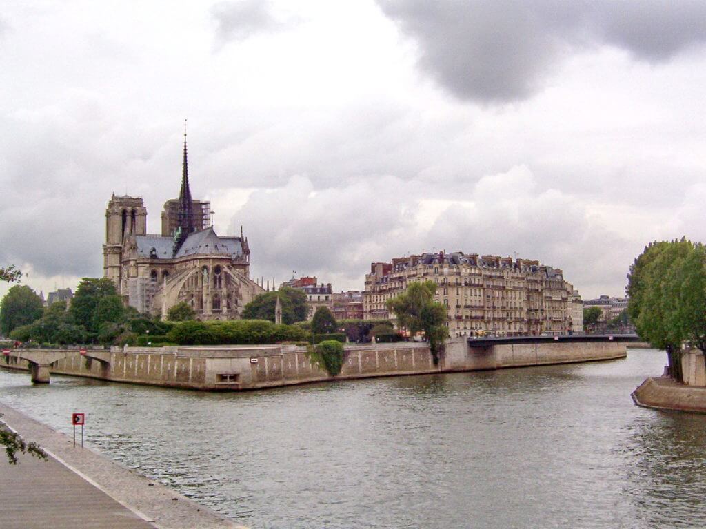 notre dame cathedral on the seine river, paris, france