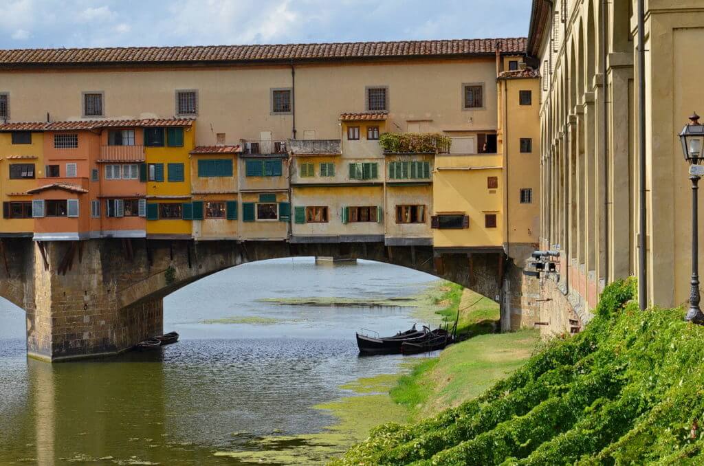 ponte vecchio and river arno in florence, italy