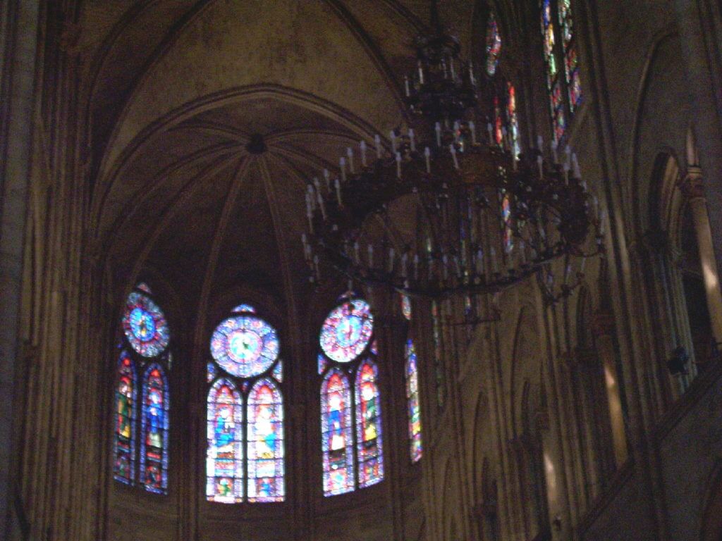 stained glass windows inside notre dame cathedral, paris, france