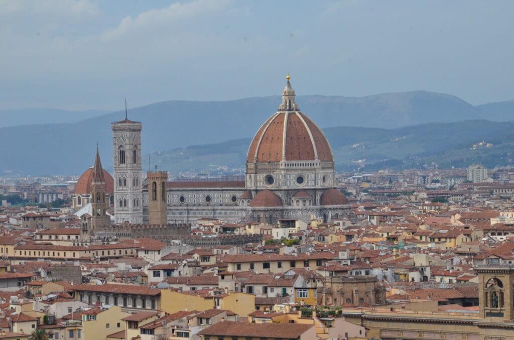 florence cathedral as seen across river arno, florence, italy