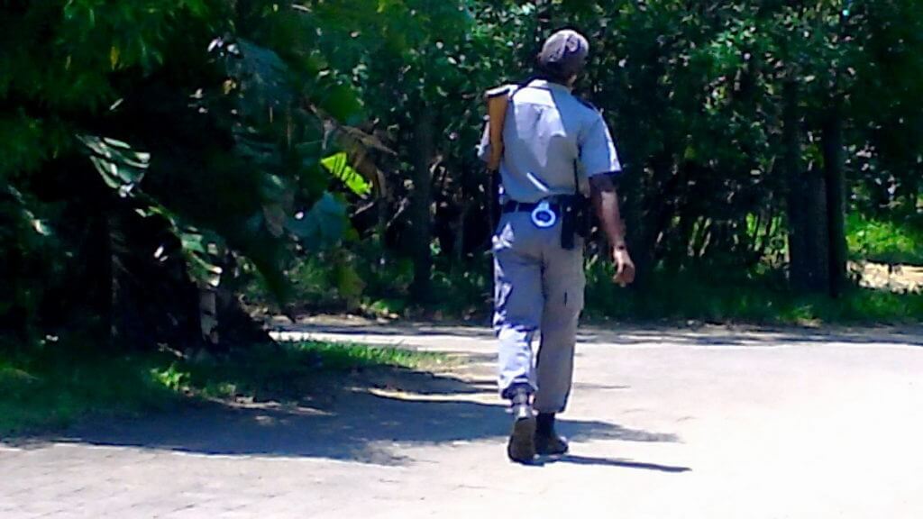 an armed guard at hilltop camp, hluhluwe-imfolozi, south africa