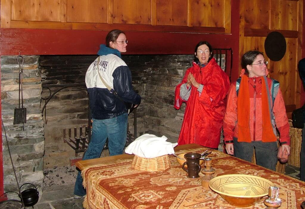 group tour inside 17-th century kitchen, colony of avalon, newfoundland, canada