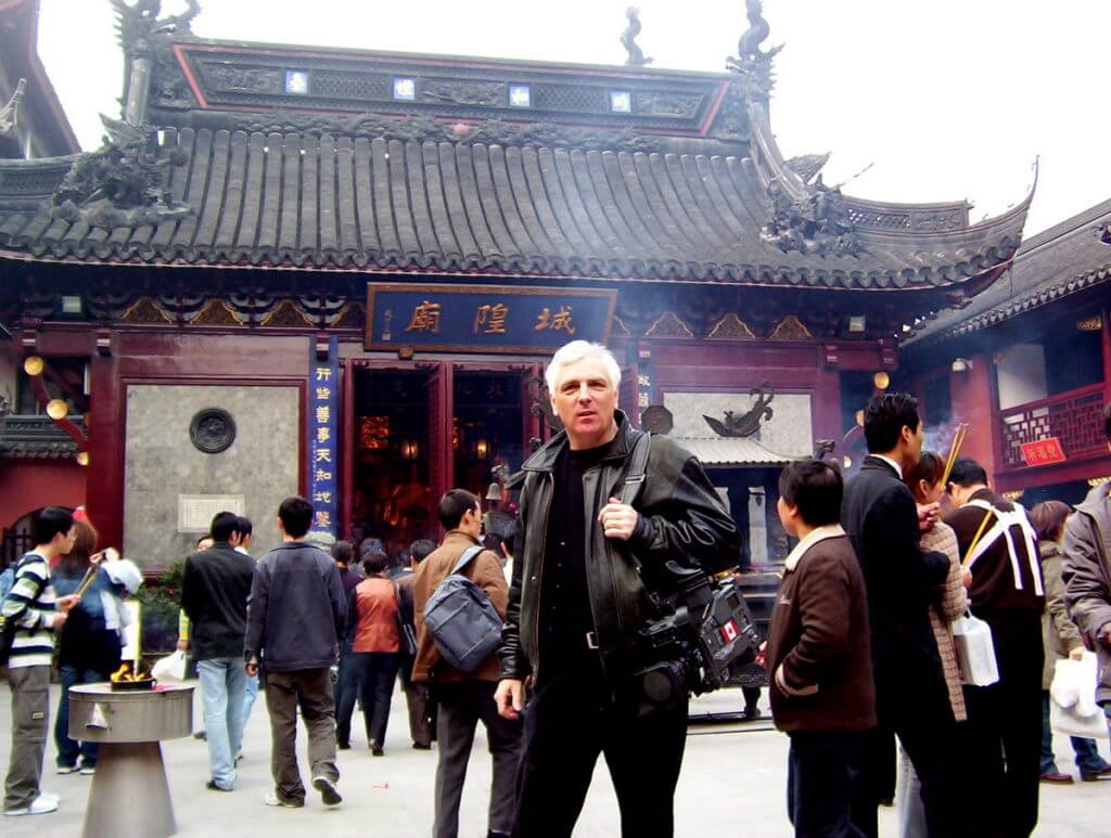 Bob standing in the main courtyard of the City God Temple of Shanghai in China.