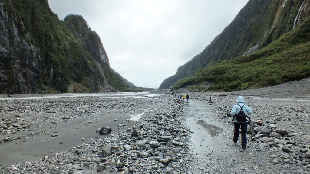 jean hiking in fox glacier valley, south island, new zealand