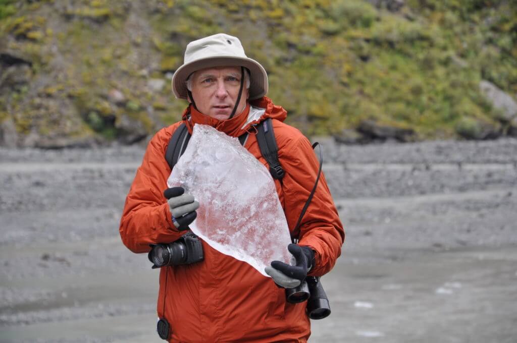 bob with ice from fox glacier, south island, new zealand