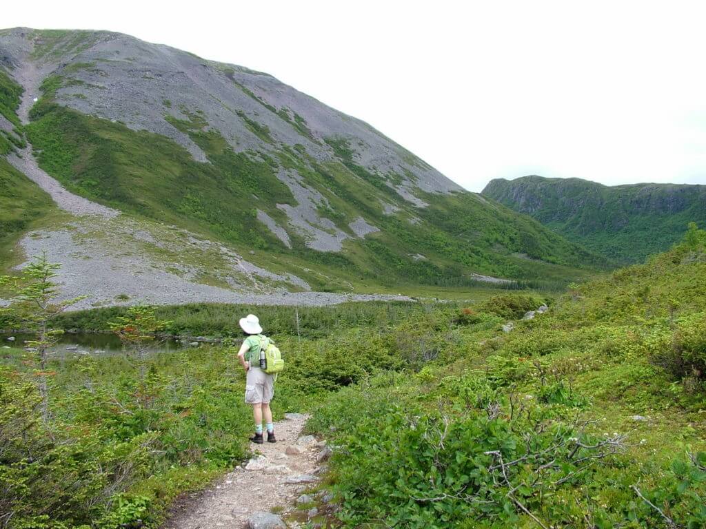 jean looking up the gully, gros morne mountain, newfoundland, canada