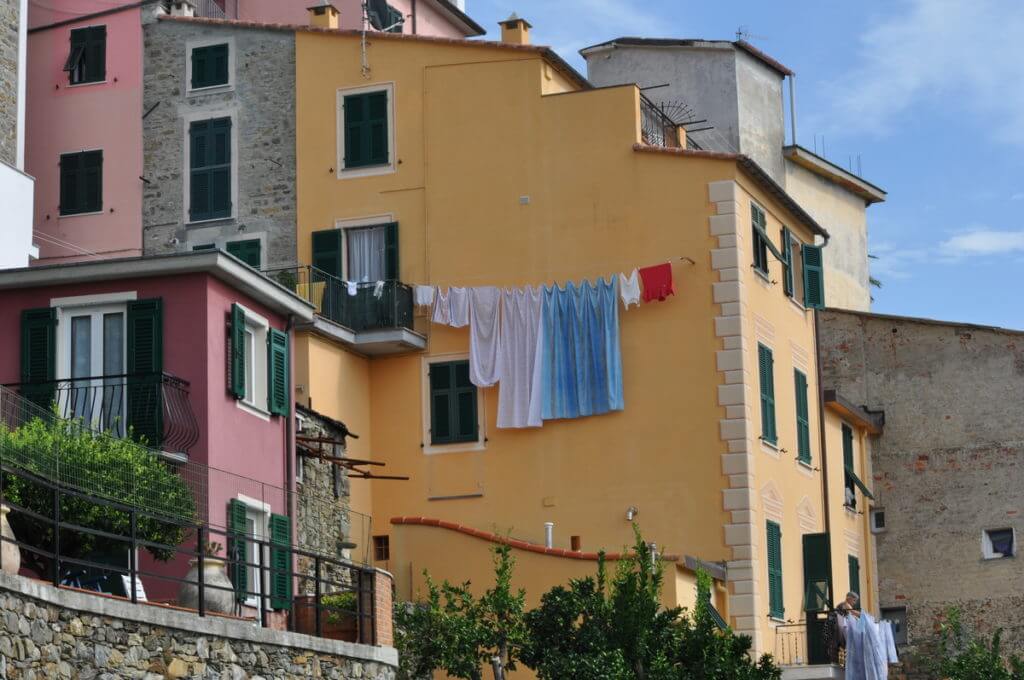 colourful house and laundry, corniglia, cinque terre, italy