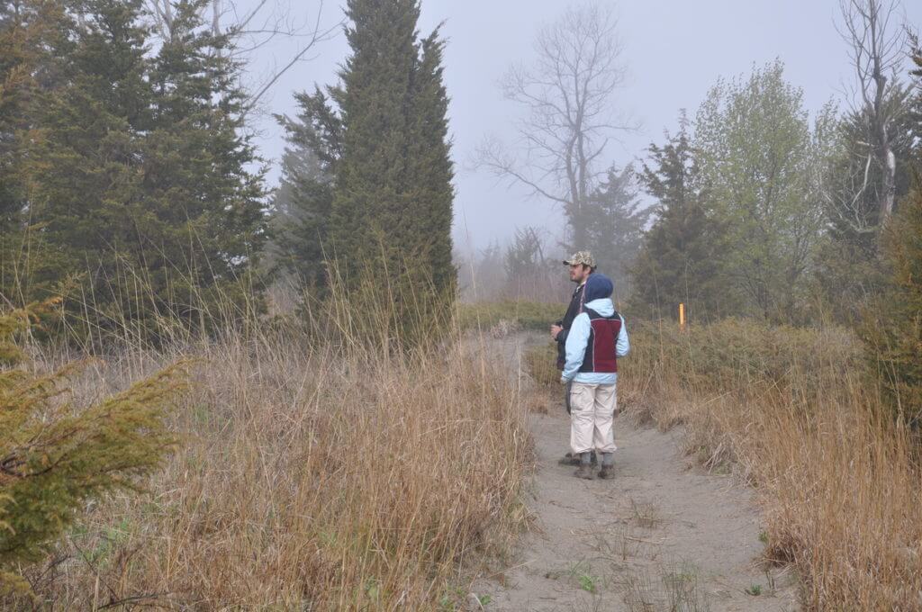 jean and garrett on a sandy trail, the tip of long point, lake erie, ontario