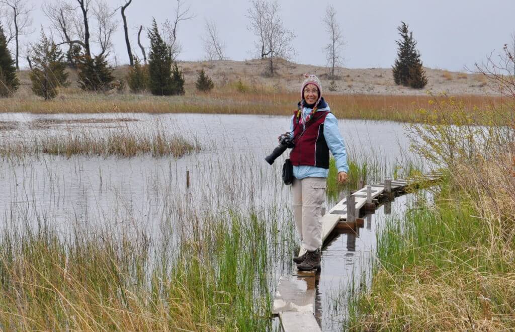 jean on a causeway across a pond, the tip of long point, lake erie, ontario