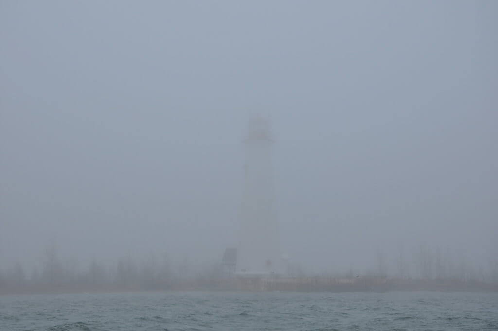 lighthouse in fog, tip of long point, lake erie, ontario
