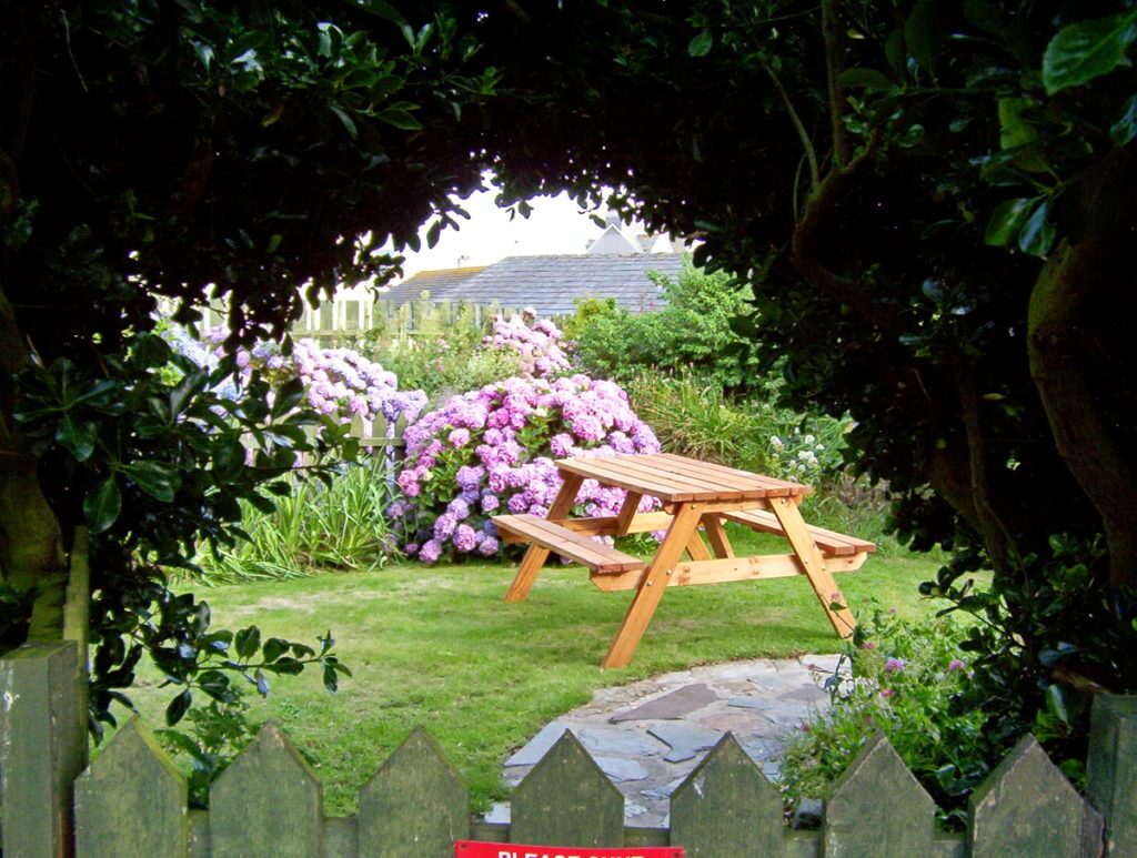 a cottage garden, tintagel, england