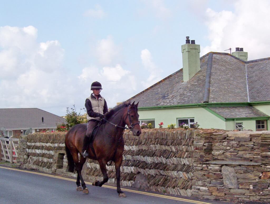 a horseback rider, tintagel, cornwall, england