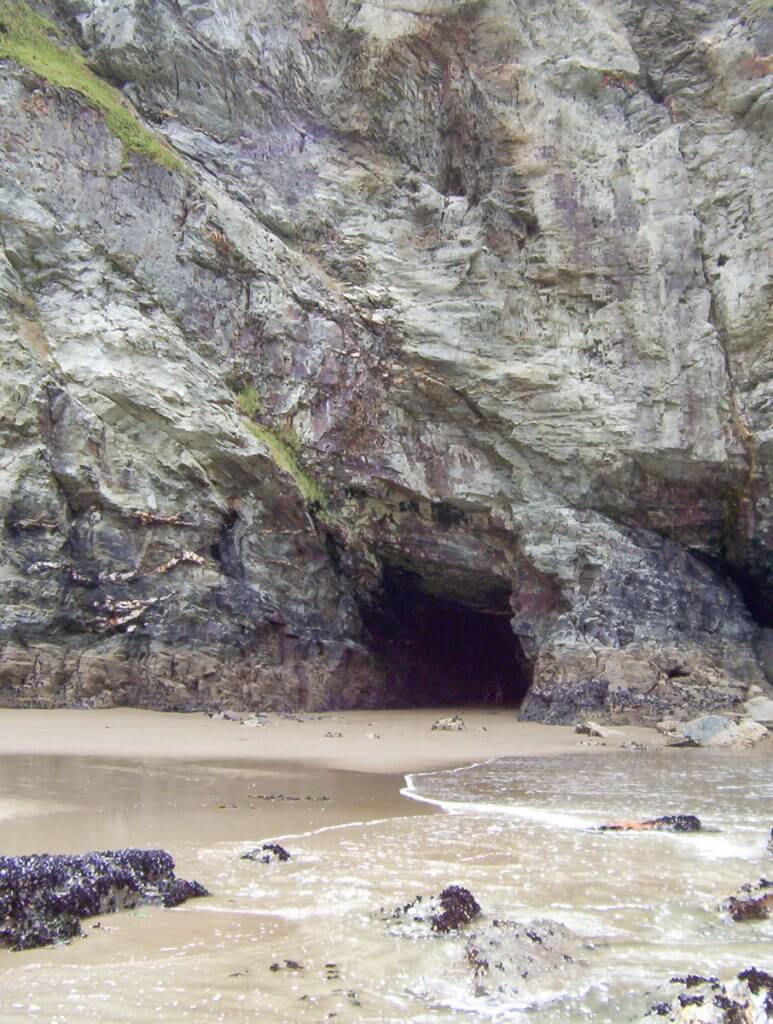 a sea cave, trebarwith strand beach, cornwall, england