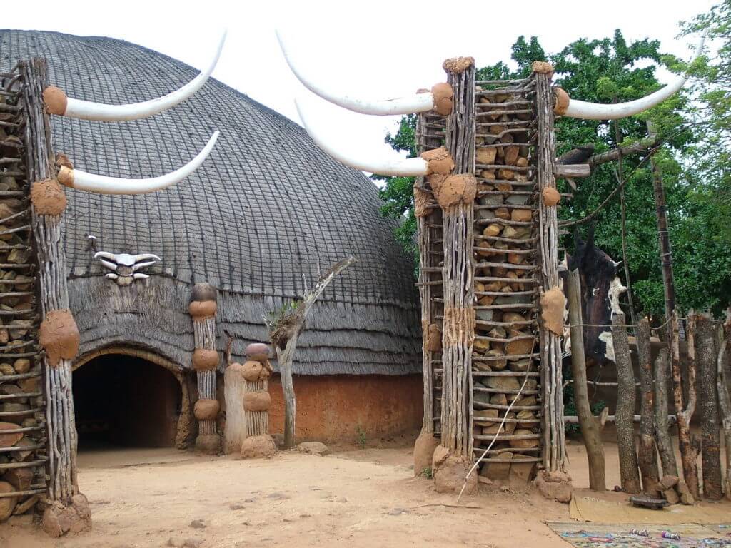 assembly hall guarded by twin towers, shakaland, kwazulu-natal, south africa