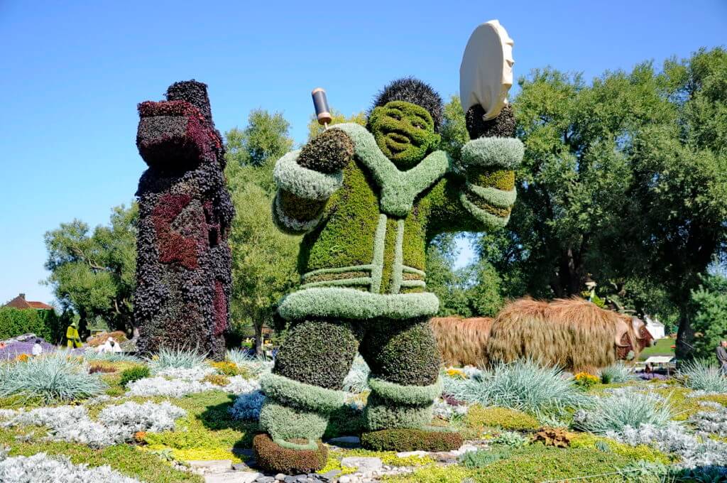 the drum dancer, inukshuk and musk ox, mosaiculture 2018, gatineau, quebec, canada