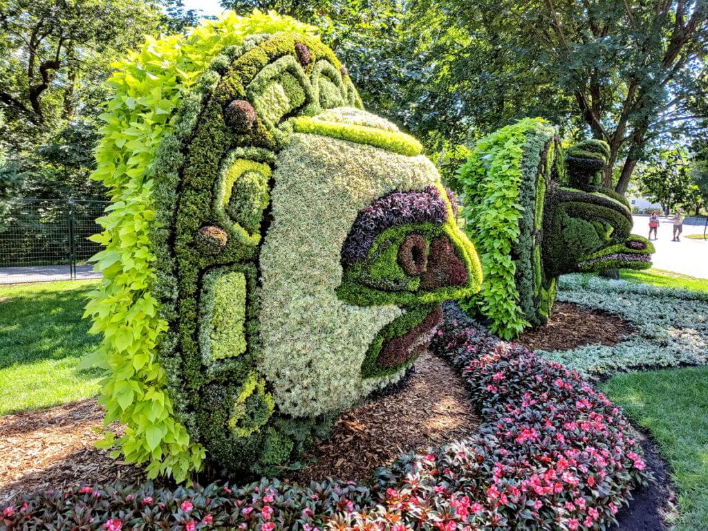 the moon and raven masks, mosaiculture 2018, gatineau, quebec, canada